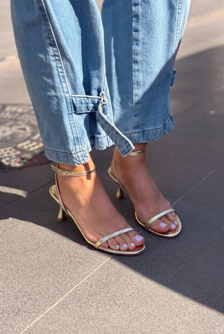 Colva Matte Leather Gold Single Strap High Heel Shoes